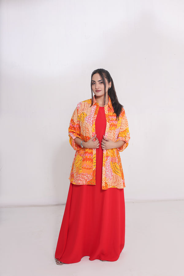 Red straight dress  paired with a vibrant  painted shirt