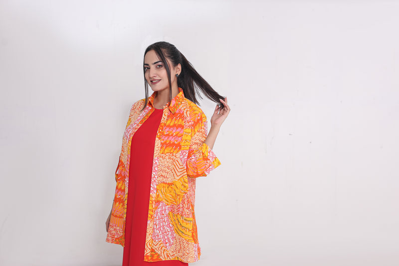 Red straight dress  paired with a vibrant  painted shirt