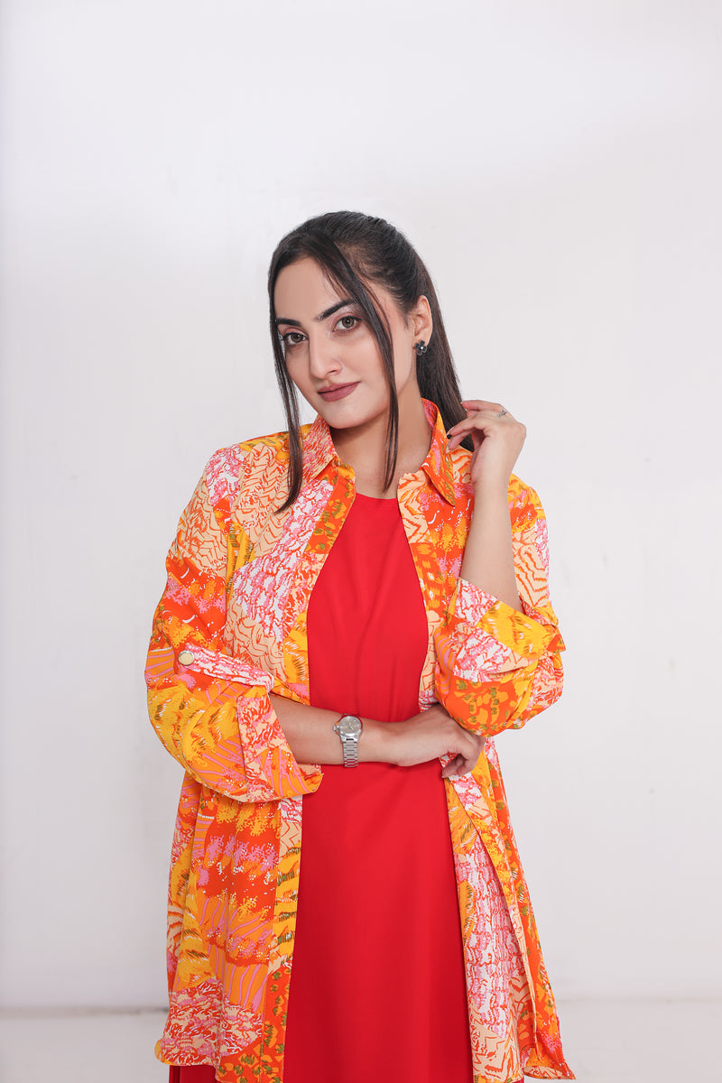 Red straight dress  paired with a vibrant  painted shirt
